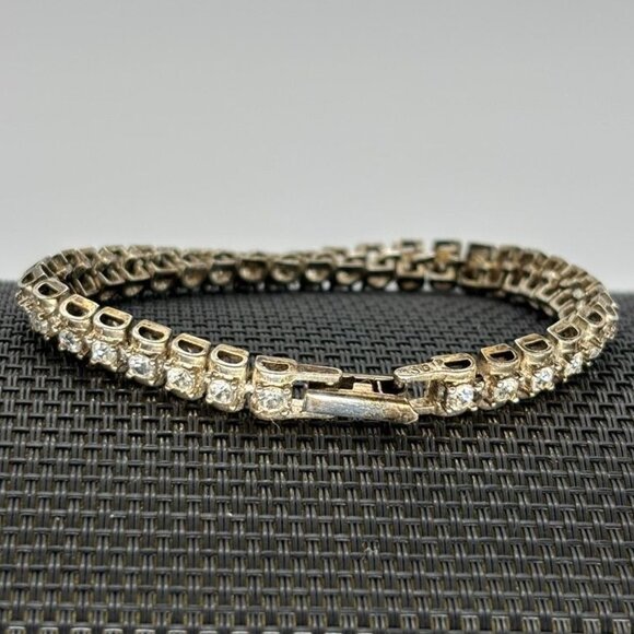 Vintage Avon Rhinestone and Silver Tone Tennis Bracelet, Signed "Avon" and "SO"" - Picture 4 of 11